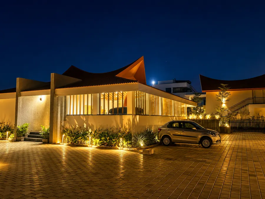 Resort exterior beautifully lit at night